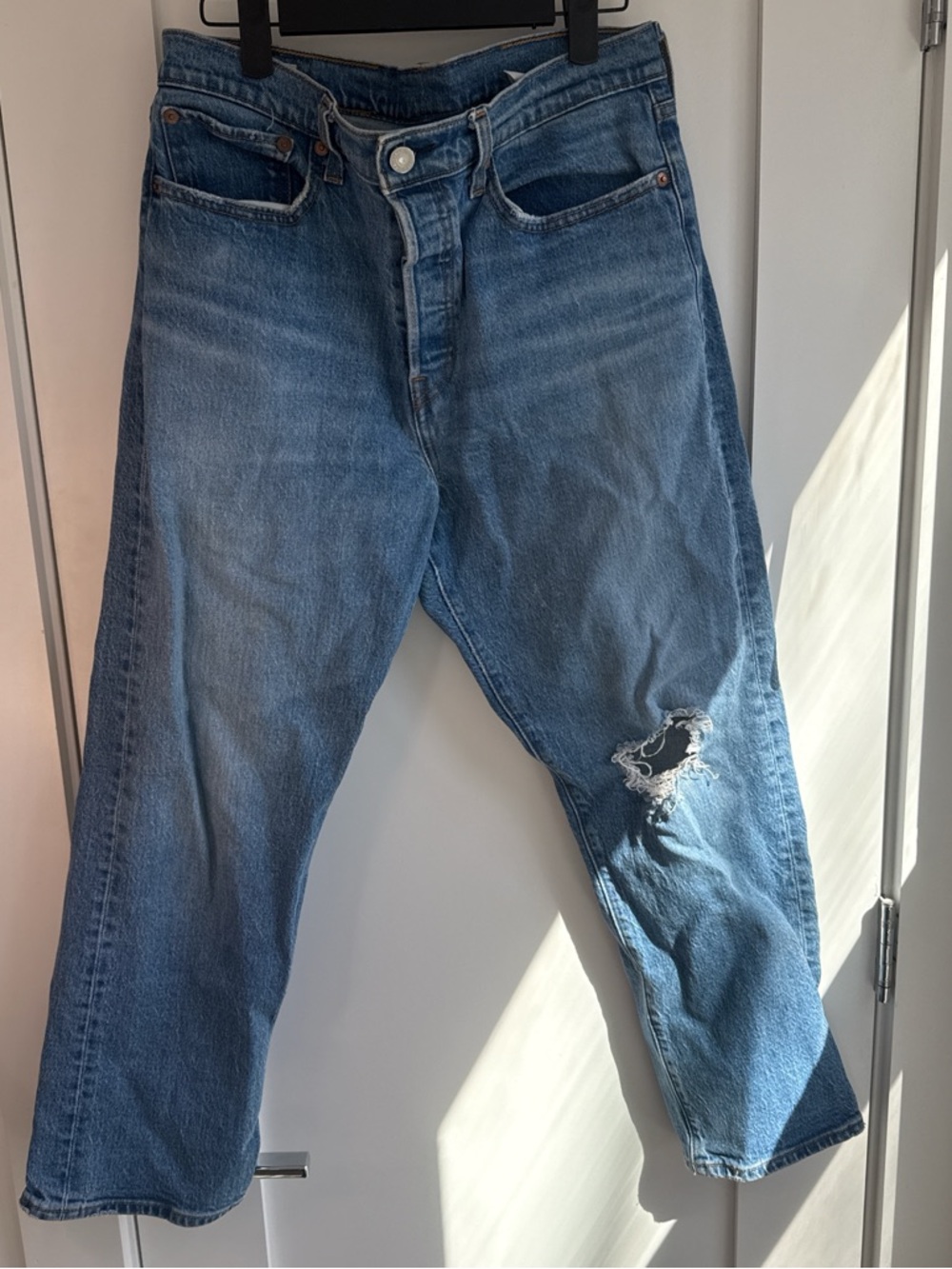 Levi's Light Blue Relaxed Fit Jeans with Knee Distress